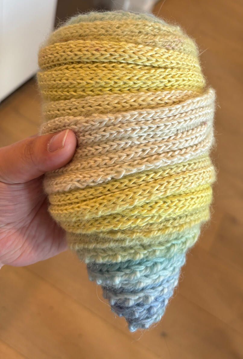 Rolled up hand dyed scarf